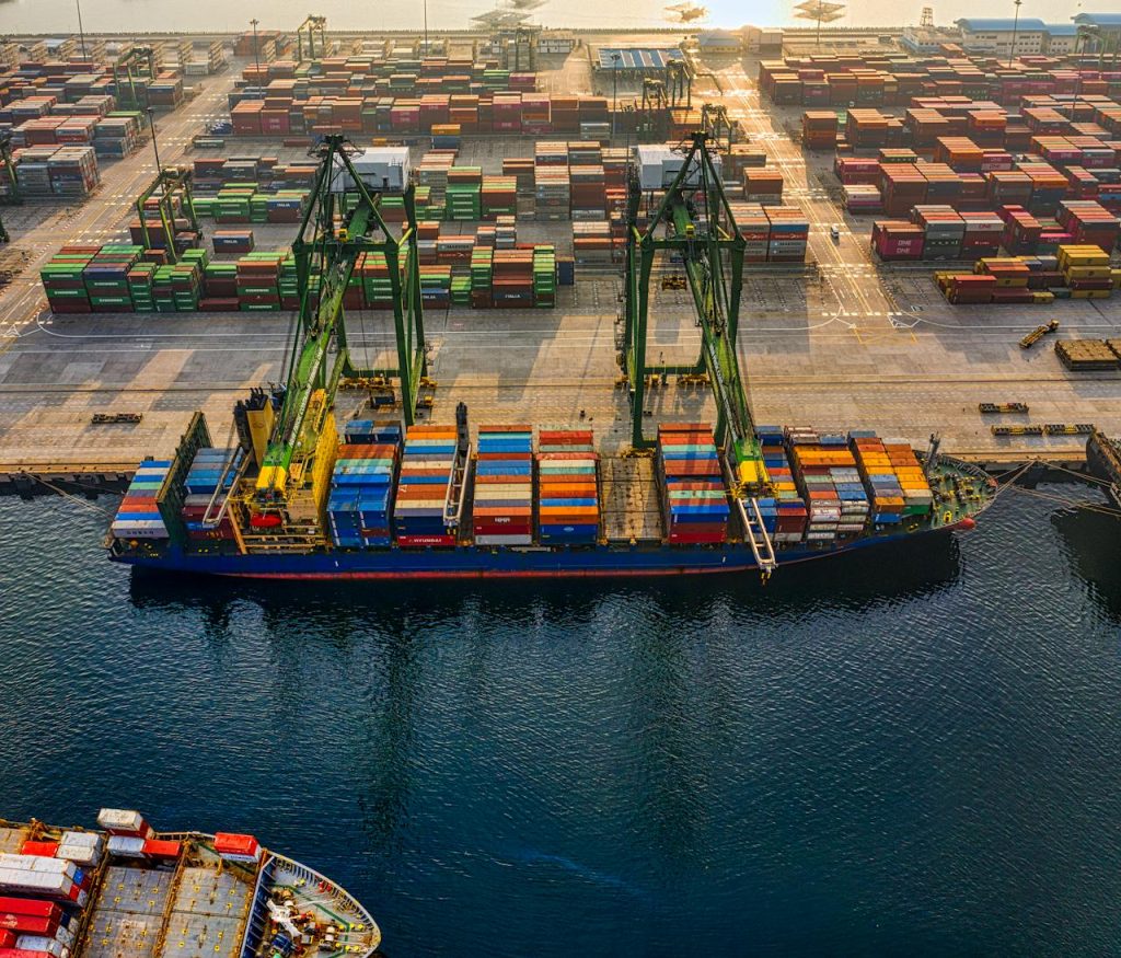 pexels photo 3856433 Aerial shot of colorful shipping containers at North Jakarta's bustling port, Indonesia.
