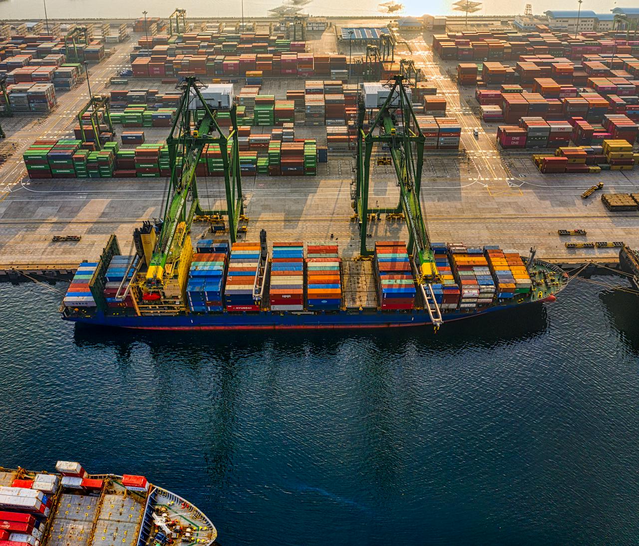 pexels photo 3856433 Aerial shot of colorful shipping containers at North Jakarta's bustling port, Indonesia.