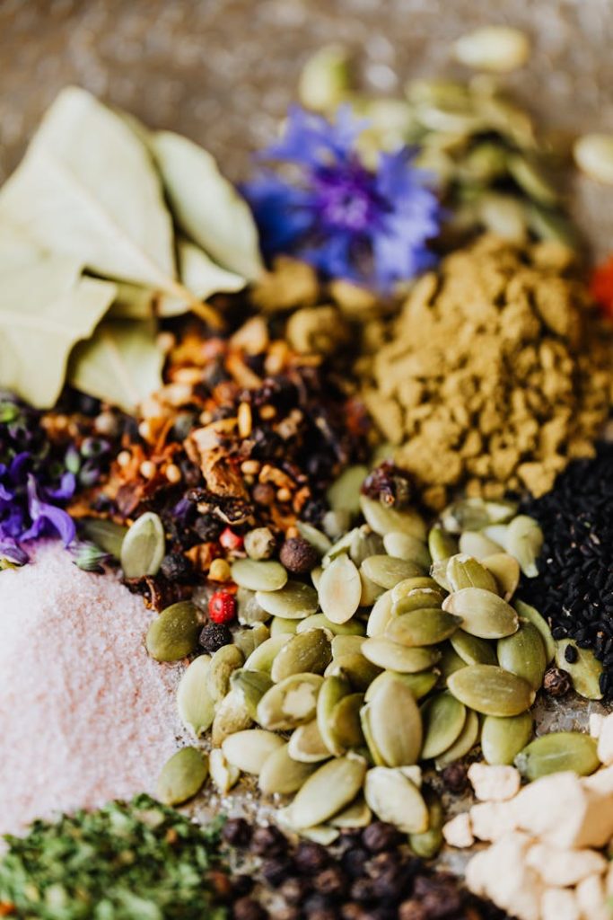 pexels photo 4871167 A colorful mix of herbs, spices, and seeds, richly showcasing natural ingredients.